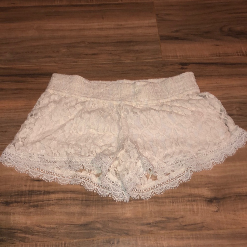 Small white lace shorts